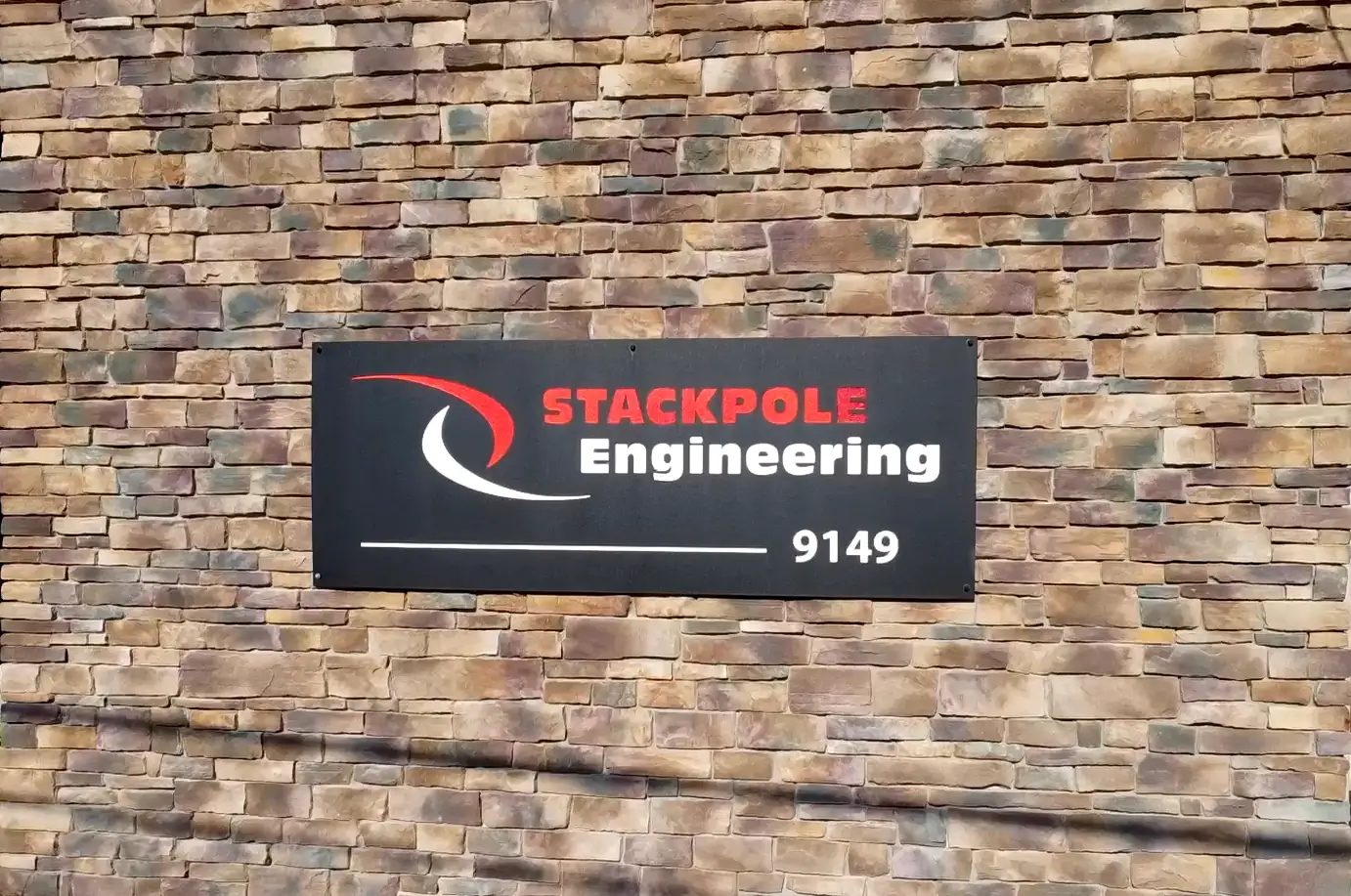 brick wall with SES sign